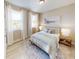 Cozy bedroom with large windows allowing for great natural light, with calm neutral tones and décor at 3252 Maya Ln # 46, Midland, NC 28107