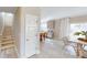 View of the stairs and dining area, adjacent to a kitchen with island seating at 3252 Maya Ln # 46, Midland, NC 28107