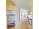 Light and bright entryway with bench seating and view into dining room at 3252 Maya Ln # 46, Midland, NC 28107