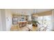 Open concept kitchen with island seating, pendant lighting, and stainless steel appliances at 3252 Maya Ln # 46, Midland, NC 28107