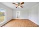 Spacious bedroom with hardwood floors and natural light at 382 Cole Campbell Rd, Taylorsville, NC 28681