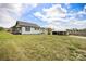 Spacious yard featuring a charming home with covered porch and an open shed at 382 Cole Campbell Rd, Taylorsville, NC 28681