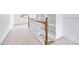 Bright hallway in the attic with built-in shelves and carpeted floors at 382 Cole Campbell Rd, Taylorsville, NC 28681