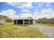 Open outbuilding on a grassy lawn at 382 Cole Campbell Rd, Taylorsville, NC 28681