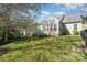 The home's lush backyard offers an inviting space for outdoor activities and relaxation at 408 Harvest Ter, Clover, SC 29710