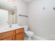 Practical bathroom features a vanity sink, toilet, and shower/tub combo at 408 Harvest Ter, Clover, SC 29710