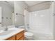 Bathroom featuring a shower-tub combo and wood-trimmed sink at 408 Harvest Ter, Clover, SC 29710