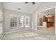 Bright dining area with tile flooring, offering a seamless transition to the adjacent kitchen at 408 Harvest Ter, Clover, SC 29710