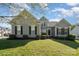 Charming two-story home with manicured lawn, gray siding, black shutters, and lush landscaping at 408 Harvest Ter, Clover, SC 29710