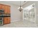 Bright kitchen connects to breakfast nook with large windows and natural light at 408 Harvest Ter, Clover, SC 29710