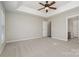 Spacious main bedroom featuring a ceiling fan and ensuite bathroom at 408 Harvest Ter, Clover, SC 29710
