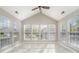 Sunroom featuring multiple windows and a ceiling fan at 408 Harvest Ter, Clover, SC 29710