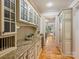 Charming butler's pantry with custom cabinets and countertops at 4400 Sharon View Rd, Charlotte, NC 28226