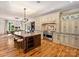 Gourmet kitchen with large island and stainless steel appliances at 4400 Sharon View Rd, Charlotte, NC 28226