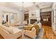 Spacious living room with fireplace and hardwood flooring at 4400 Sharon View Rd, Charlotte, NC 28226