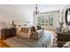 Bright main bedroom with a window view and hardwood flooring at 4400 Sharon View Rd, Charlotte, NC 28226