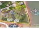Aerial view of lakefront property featuring a dock and shoreline, with the property lines highlighted at 477 Big Indian Loop, Mooresville, NC 28117