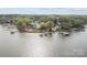 Beautiful lakefront homes with private docks create a picturesque lakeside setting at 477 Big Indian Loop, Mooresville, NC 28117