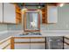 Modern kitchen features stainless steel sink, appliances, and white countertops at 477 Big Indian Loop, Mooresville, NC 28117
