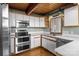 Bright kitchen features stainless appliances, modern countertops, and plenty of cabinet space at 477 Big Indian Loop, Mooresville, NC 28117