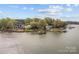 Serene waterfront homes nestled among mature trees, each with its own private dock at 477 Big Indian Loop, Mooresville, NC 28117