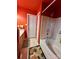 View of bathroom with a shower-tub combo with decorative rug and tiled flooring at 4927 Curtiswood Dr, Charlotte, NC 28213