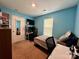 Bedroom with a bed, desk and natural light from the window at 4927 Curtiswood Dr, Charlotte, NC 28213