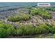 An aerial view of homes near the amenity center with a lake view at 4989 Samoa Ridge Dr, Lancaster, SC 29720