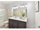Modern bathroom with a sleek vanity, a large mirror, and a glass-enclosed shower at 4989 Samoa Ridge Dr, Lancaster, SC 29720