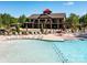 Community swimming pool with lots of seating and an outdoor clubhouse at 4989 Samoa Ridge Dr, Lancaster, SC 29720