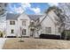 Stunning white painted brick two-story home with an immaculate yard at 510 Poindexter Dr, Charlotte, NC 28209