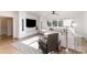 Bright and open living room featuring a large sectional sofa, TV, and natural light at 510 Poindexter Dr, Charlotte, NC 28209