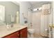 Clean bathroom includes a shower, a vanity, and a decorative shower curtain at 5121 Alysheba Dr, Indian Trail, NC 28079