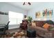 Inviting living room features hardwood floors, a desk with tv and comfortable seating for relaxing at 5121 Alysheba Dr, Indian Trail, NC 28079