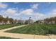 Well-maintained park with walking path and gazebo offers a serene setting for relaxation and community events at 5121 Alysheba Dr, Indian Trail, NC 28079