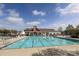 Community pool with ample seating provides a refreshing escape for residents on hot days at 5121 Alysheba Dr, Indian Trail, NC 28079