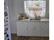 Well-lit kitchen features granite countertops, modern appliances, and abundant natural light at 526 Arlington Ave, Albemarle, NC 28001