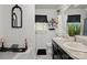 Bathroom featuring double sinks, a vanity, stylish decor, and a luxurious bathtub at 5762 Hightower Rd, Fort Lawn, SC 29714