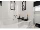 Elegant bathtub with decorative elements for a spa-like experience and relaxation at 5762 Hightower Rd, Fort Lawn, SC 29714