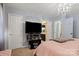 Cozy bedroom featuring soft lighting, a TV, and soothing pastel color scheme at 5762 Hightower Rd, Fort Lawn, SC 29714