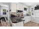 This kitchen features stainless steel appliances, ample counter space, and white cabinets at 5762 Hightower Rd, Fort Lawn, SC 29714