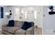 Cozy living room with comfortable seating, neutral walls, and bright lighting at 5762 Hightower Rd, Fort Lawn, SC 29714
