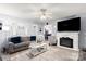 Comfortable living room with a fireplace, plush seating, and stylish decor at 5762 Hightower Rd, Fort Lawn, SC 29714
