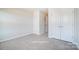 Bedroom with a carpeted floor and a double door closet at 6427 Mallow Crossing Ln, Charlotte, NC 28213