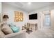 Cozy living room with comfortable seating and a mounted television at 6427 Mallow Crossing Ln, Charlotte, NC 28213