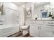 Bathroom with a shower-tub combo, white vanity, and neutral walls at 7144 Hodges Meadow Ln, Charlotte, NC 28213
