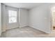 Bedroom with neutral carpet and a window bringing in natural light at 7144 Hodges Meadow Ln, Charlotte, NC 28213