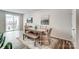 Cozy dining area with a bench seat and sliding door to patio at 7144 Hodges Meadow Ln, Charlotte, NC 28213
