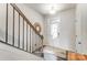 Entryway features a white front door and a view of the staircase at 7144 Hodges Meadow Ln, Charlotte, NC 28213