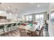 Open-concept living space with an eat-in kitchen and dining area at 7144 Hodges Meadow Ln, Charlotte, NC 28213